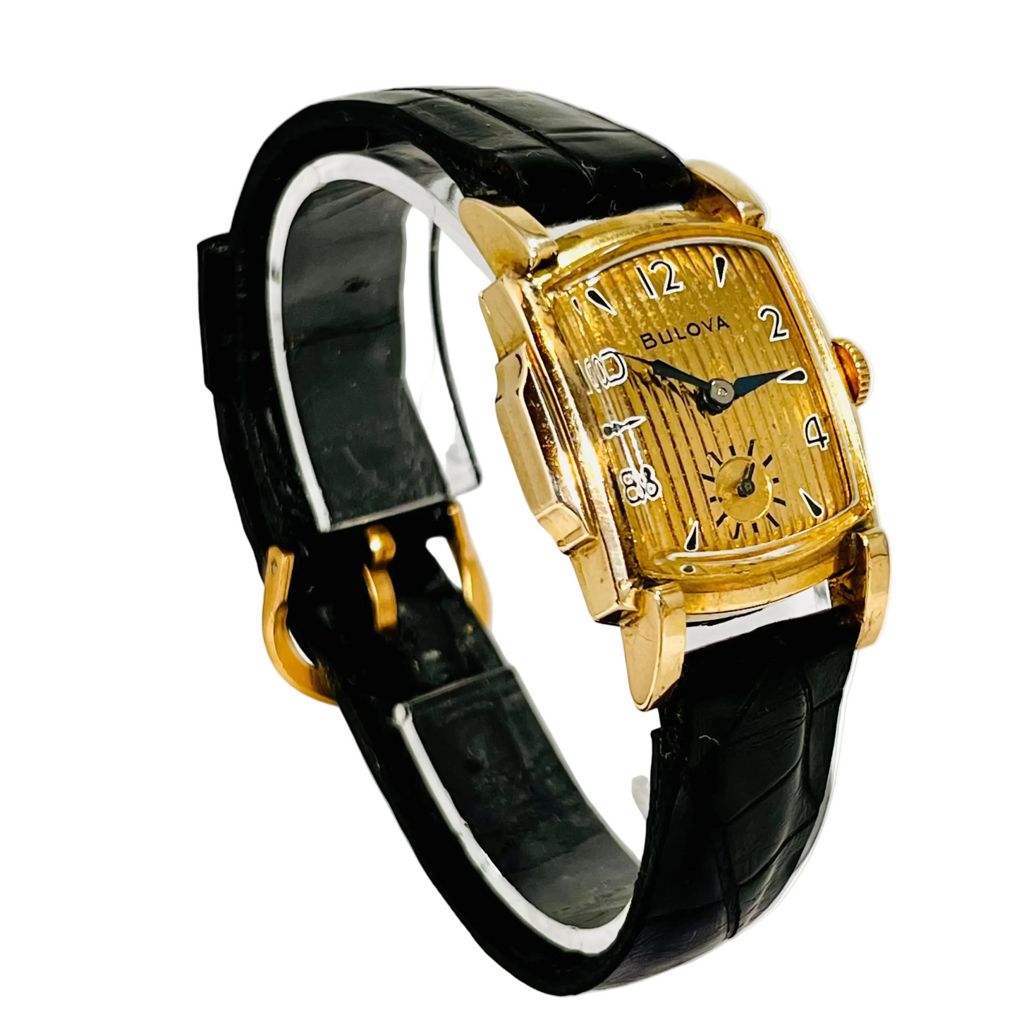 A vintage Bulova Academy Award Z watch with a curtain rectangular dial, gold filled case, and a black leather alligator strap 