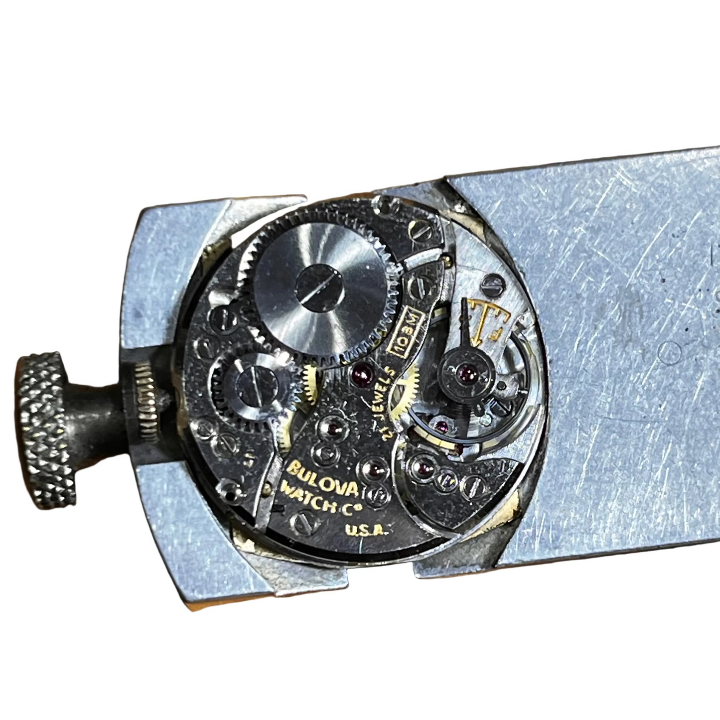 A close-up of a vintage Bulova Watch 10BM Movement 